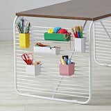 Linear Play Table by Eric Trine, $399

Similar to the book cart, this play table is made of a powder-coated steel frame and a range of storage accessories that can be hung on its sides. The surface is made from mango wood.