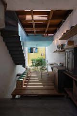 A Narrow Courtyard Joins a Unique Two-Family Home in Saigon - Photo 7 of 10 - 