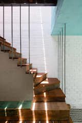 Six staircases, many open to outside light, serve as pathways between the private interior spaces.