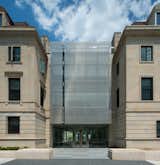 The existing structures, built in the Dutch Cape style, received updated building systems, security, and general maintanence. The atrium now serves as the central entry point for the complex.