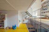 By creating so much open space, the family can feel connected even while on separate floors. “We were looking for an easy and fast connection among the four levels,” says the firm.  Photo 5 of 7 in A 16-Foot-Wide Barcelona Row House Gets Creative to Stay Bright and Airy by Alex Vuocolo