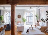 Exposed structural beams are a historic nod to the loft’s previous life as a 19th-century warehouse and shipping dock. For the Copes, inspiration for creative projects never draws far from home; they named Calico after their cat, Irie.