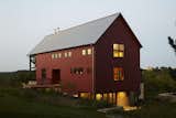 From red painted cedar siding to no-fuss structural elements, Northworks’ solution reaches a happy medium between the classic barn look and a weekend retreat. “The best thing about this house,” explains one resident, “is that when it’s just the four of us, it feels cozy. But even when we’re hosting 25 people, it never feels crowded.”