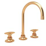 The Graceline fixture by Michael Berman for Rohl is on trend with its warm gold tone.
