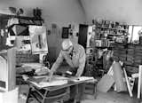 Le Corbusier in his apartment and studio in Paris, France.