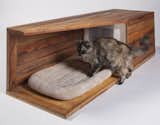 Douglas Teiger, managing principal at Abramson Teiger Architects of Culver City, designed and built this cat house with his 11-year-old son, Jared, using leftover cedar siding and an old plastic box. The total cost: under $20.