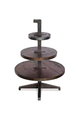 An industrial take on the cake stand, this hardy piece by Tom Dixon is made of durable steel plates.