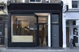 Outdoor Kaffeine

Tozer refurbished the interior and exterior of this tiny retail space in Fitzrovia, preserving the existing shopfront and painting it jet-black.  Search “london design festival kanittha mairaing” from The Architect Behind Some of London's Homiest Coffee Shops