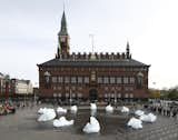 "Ice Watch," Olafur Eliasson, 2014.

Twelve large blocks of ice, transported from Greenland, were displayed in a clock formation and left to melt. This work was first staged in Copenhagen, and later in Paris, both times in conjunction with UN meetings about climate change.  Photo 1 of 8 in Eight of Our Favorite Works by Artist Olafur Eliasson by Allie Weiss