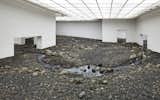 "Riverbed," Olafur Eliasson, 2014.

This site-specific installation for the Louisiana Museum of Modern Art in Humlebæk, Denmark, creates a complete rocky enviornment inside the white-walled gallery.