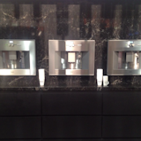 "Gaggenau espresso makers and @caesarstoneus Vanilla Noir quartz surface, debuting at #KBIS2015"  Search “richard sapper espresso coffee maker” from Kitchen and Bath Trends We Spotted at KBIS and IBS 2015