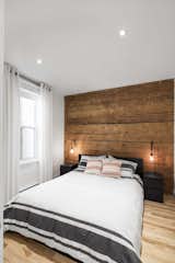 Exposed wooden boards like shiplap can act as a feature wall and add texture and depth to a space.
