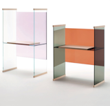 Ronan and Erwan Bouroullec's Diapositive collection features a desk in colored glass, lined with wood edges. It's also available as a bookshelf or bench.