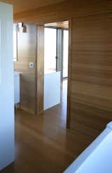 The interior walls and floors are carbonized bamboo; this material consists of regular bamboo flooring treated with steam to create a darker and richer color.