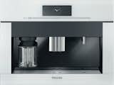 The new espresso/coffeemaker from Miele has one foot in the future, with the latest self-cleaning technology and a sleek white-glass finish, and one in the past, with an analog clock.