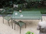 Bouroullec Studio also presented a 13-piece outdoor collection called Palissade, made of powder-coated steel in a forest green shade.