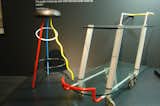 Mariscal's furniture designs for the postmodern Memphis design and architecture group, created in the early 1980s, convey his exuberant sensibilities. The Duplex Bar Stool, left, and the Hilton Trolley Serving Cart, right.