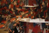 The brothers Campana attend to the finishing touches of the Bolon booth. The Stockholm–based company, which manufactures woven vinyl products, enlisted the designers to collaborate on their latest collection, called Artisan.