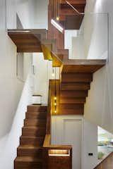 #stairs #interior #inside #indoor #FraherArchitects #London #modern #minimalist #wood #glass #shape #lighting #walnut #TomDixon 

Photo by Jack Hobhouse
