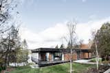 #midcentury #midcenturymodern #exterior #cedarplanks #stone #lakehouse
#outdoors #canada #lakemasson #quebec 
