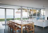 #dining #diningroom #modern #architecture #modernarchitecture #interior #indoor #table #Wishbone #chairs #pendantlamp #HansWegner #Cabinet #Ontario #Canada #RichardWilliamsArchitects  