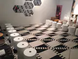 KinderModern's booth at Sight Unseen Offsite featured their take on the chess board. The "board" consisted of a graphic modular rug design they created, and the pieces included various stools and seating pieces they carry. #kindermodern #DwellNow #sightunseenoffsite #childrensfurniture