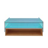 Hampton low table by Eric Jourdan for Ligne Roset 
Referencing Mies van der Rohe’s Farnsworth House, this architectural piece marries cherrywood and laminated glass.  Photo 4 of 7 in Calvin Klein by Kyle Diener from Coffee Tables That Would Make Yves Klein Proud