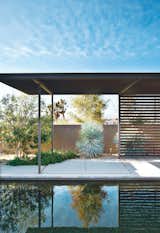 Las Vegas modern desert prefab backyard pool with concrete patio and metal awning accents