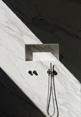 #bathandspa #modern #moderndesign #interiordesign #bathroom #fixtures #inside #interior #naturallighting #marble #shower #glassatrium #mastersuite #vola 

Photo courtesy of Bryce Duffy  Photo 8 of 9 in Bathroom by Rahla Schaffer