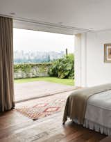 The master bedroom enjoys views of the city.