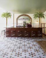 Faust, the hotel's restaurant, hearkens back to 19th-century Bavarian beer hall. The bar, stools, and furniture in the space are by Jessica Carnevale, a RISD-trained designer who's based in Brooklyn.  Photo 7 of 15 in This Boutique Hotel Loves its City Like No Other