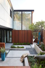 Outdoor, Small Patio, Porch, Deck, Pavers Patio, Porch, Deck, and Back Yard Outer Space Landscape Architects refreshed the courtyard with new hardscaping.  Photo 1 of 9 in Mid-Century modern inspiration by Camden Johnson from Not the Eichler Post-and-Beam Style You Know
