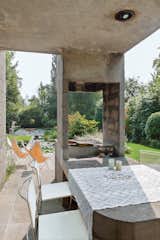 #outdoor #exterior #dining #table #diningtable #lake #pond #fireplace #bbq #concrete #rural #belgium #villa #1970s #hardoy #butterflychair #knoll 

Photo courtesy of Frederik Vercruysse  Photo 5 of 14 in Beautiful Backyards by Meg Dwyer