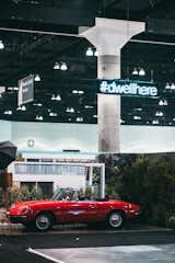 Sitting in front of an enlarged photograph of a house in Venice from the June 2016 issue is a 1966 Alfa Romeo Duetto Spider provided by the Petrolicious Marketplace. Make sure to share your favorite moments from the show by using #dwellhere—we'll be doing the same on the platform.