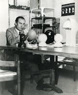 Vico Magistretti designed the Eclisse light in the 1960s. The Italian architect and designer is known for his popular furniture and products, produced for prominent brands including Artemide, Cassina, Fritz Hansen, and Kartell.