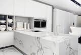 Kitchen, Marble, White, Marble, and Marble High-performance materials like Dekton by Cosentino are new alternatives for granite. The surface is scratch-resistant and easier to clean than stone.  Kitchen Marble White Marble Photos from New Kitchen Materials You Should Know About