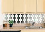 Another increasingly popular option is kitchens that are not static, but can be changed over time. Self-adhesive coverings, like the Squares Squared wallpaper by Chasing Paper ($30 per four-by-two-foot panel), can be swapped out seasonally.