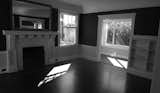 The adjoining living room, formerly the dining area, is kept free of playthings, TKTKTKTK  Photo 6 of 14 in Check Back