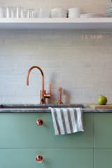 Kitchen, Undermount Sink, and Marble Counter Lyons and Brill designed several custom touches, like the copper-plated knobs they installed on the Sektion kitchen cabinetry from IKEA, painted in Farrow &amp; Ball’s muted Breakfast Room Green.  Photo 7 of 15 in Farmhouse by Tom Elkington from Modern Becomes Eclectic in This Renovated Brooklyn Townhouse