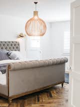 Adding a partial second floor accommodated bedrooms for Lena; her son, Wylie; and her daughter, Teddy. The master bedroom features a Chesterfield bed from Restoration Hardware and a pendant by Seppo Koho. “I saw tons of houses that were done and a few that needed redoing,” says Lena. “This one was small, but it made sense.”