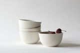 Woodgrain bowls, slipcast porcelain from hand-turned wood pieces, by Abigail Murray
