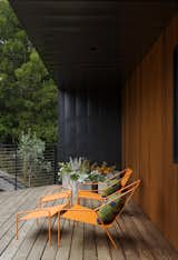 Together with Nick Dine, Chris also designed the concrete planters, pillows, and powder-coated steel lounge chairs on the front deck; all are part of the Modern by Dwell Magazine home collection for Target. Predominantly native, fire-resistant plantings dot the property, which sits in a wildland urban inter-face (WUI) zone.
