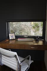 Office, Chair, and Desk Chris designed a custom built-in desk in the den for Ellen, who often works from home.  Photo 1 of 1 in Office by Heather McA from Moving Mountains