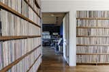 Downstairs are more shelves of records, the master and guest suites, and Jack’s music studio.