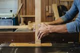 Making the screen is like putting together a puzzle. Here, an attachment on the table saw is used to cut the grooves that will be needed for the final assembly.  Photo 4 of 9 in How to Shape a Shoji, Step by Step