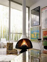 The Malm Fireplace via DWR is available in black, white, or stainless-steel.