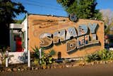 Shady Dell Vintage RV Airstream Travel Trailer Park colorful brick mural entrance sign in Bisbee, Arizona.