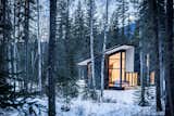 Designed by Canadian workshop Form and Forest, this angular house located on the Blaeberry River near Golden, British Columbia, has a living room with vaulted ceilings that looks out to 180-degree views of the forest, mountain, and rivers.&nbsp;