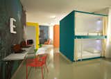 Accommodations at Hostel Emanuel are color-blocked with bright hues.