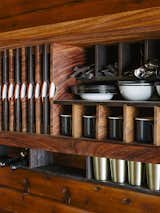 Storage Room and Shelves Storage Type The kitchen was designed like a ship, with built-in storage created by Conrad Contracting.  Photo 7 of 14 in Madrona by Dwell from An Eclectic Paciﬁc Northwest Cottage